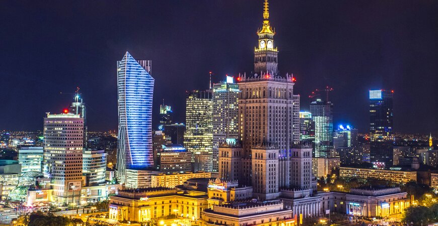 Warsaw skyline at night with the Palace of Culture and Science